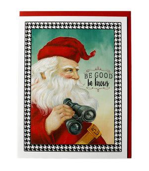 a christmas card with a santa holding a camera